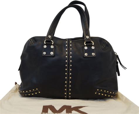 michael kors black bag with gold studs|Michael Kors black studded handbag.